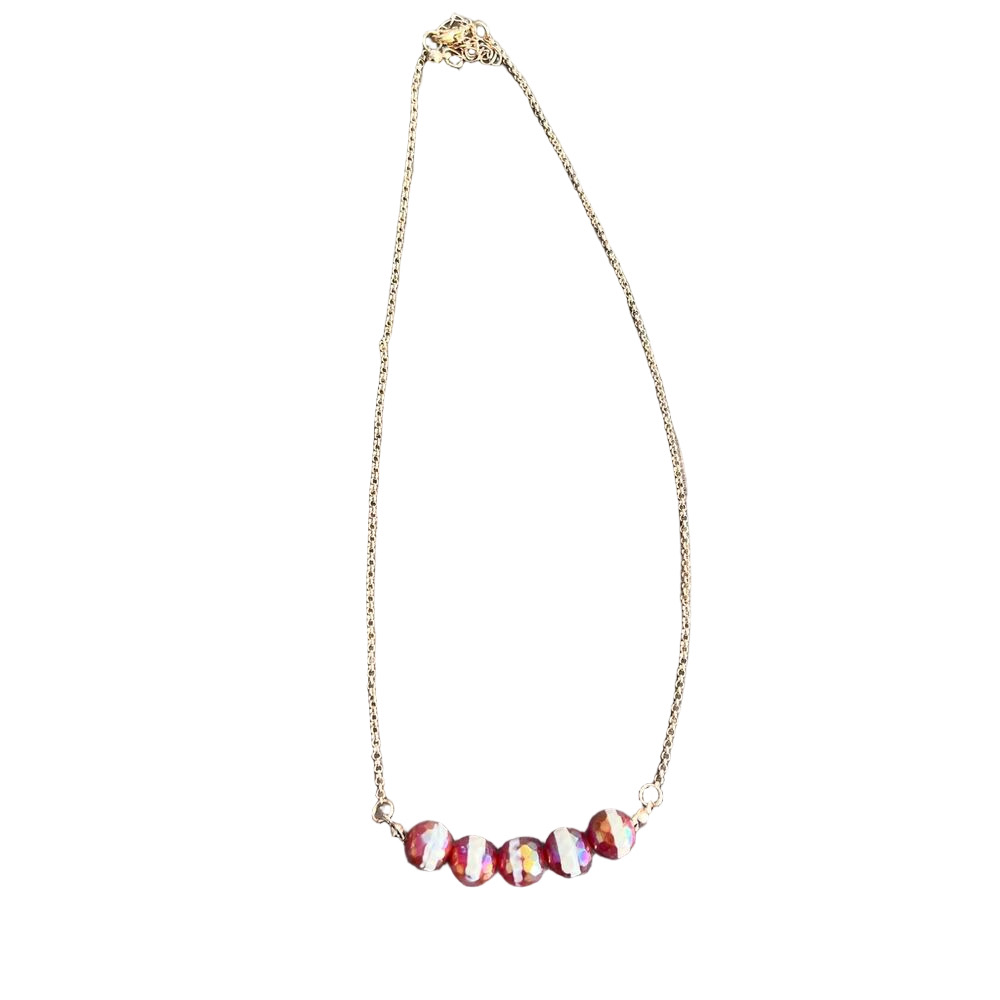 Red and white iridescent faceted beaded necklace on a gold tone chain